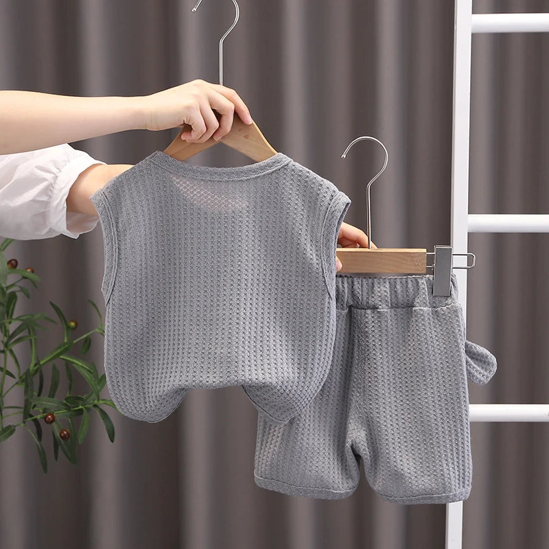 Ropa de oso para niños y niñas, chaleco de cuello redondo, pantalones cortos, chándales de dibujos animados para niños pequeños, moda de verano, nuevo conjunto de 2 piezas