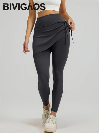 BIVIGAOS-mallas de Yoga plisadas con cordón para mujer, falda, pantalones falsos de dos piezas, mallas deportivas elásticas de cintura alta para primavera