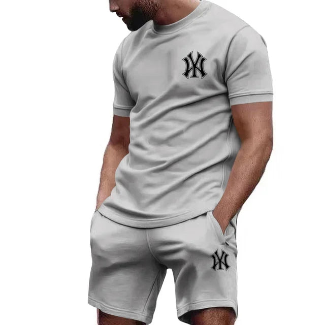 Nueva ropa deportiva de dos piezas para hombre, conjunto de camiseta y pantalones de manga corta, ropa deportiva para correr y fitness, superventas, 2025, verano