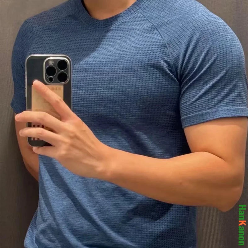 Camiseta Deportiva sin Costuras para Hombre, de Secado Rápido, Transpirable, con Malla Técnica, para Gimnasio, de Alta Elasticidad, para Fisicoculturismo y Fitness, de Manga Corta