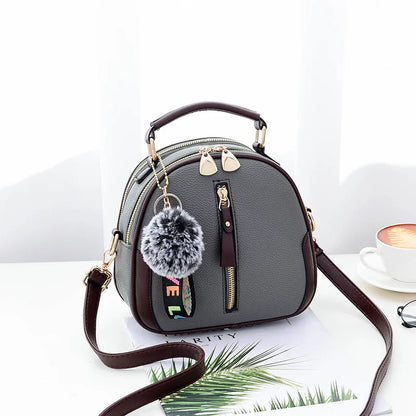 Bolsos pequeños de cuero PU para mujer, bolso de hombro tipo bandolera con diseño de bola de pelo, bolsos de mensajero de lujo a la moda para mujer