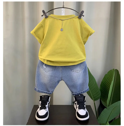 Conjunto de Verano para Niños 2026, Camiseta de Algodón con Estampado de Dibujos Animados y Letras + Pantalones Cortos de Mezclilla, Ropa Infantil