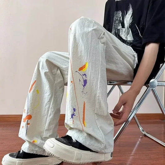 Pantalones bombachos con grafiti para hombre, moda Hip Hop americana, pantalones de chándal holgados de pierna ancha y recta, ropa de calle Y2K de verano, novedad de 2025