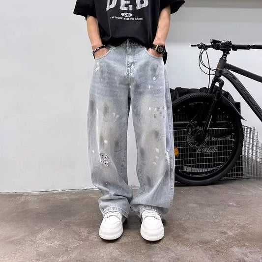 Pantalones vaqueros de pierna recta holgados rasgados de otoño para hombre, moda Hip Hop, pantalones vaqueros con estampado de grafiti, ropa de calle informal Y2K, pantalones vaqueros