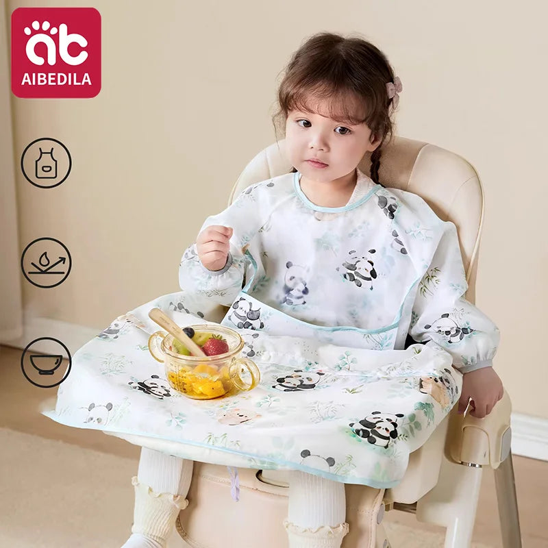 AIBEDILA Baberos impermeables para bebés, babero de manga larga para destete, se sujeta a la mesa de la trona, dobladillo desmontable, 6M-6T