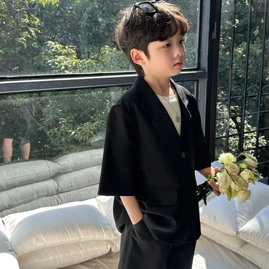 Conjunto de traje de alta calidad para niño, chaqueta informal fina de un solo pecho, abrigo de manga corta negro coreano + Pantalones cortos, 2 piezas, novedad de verano
