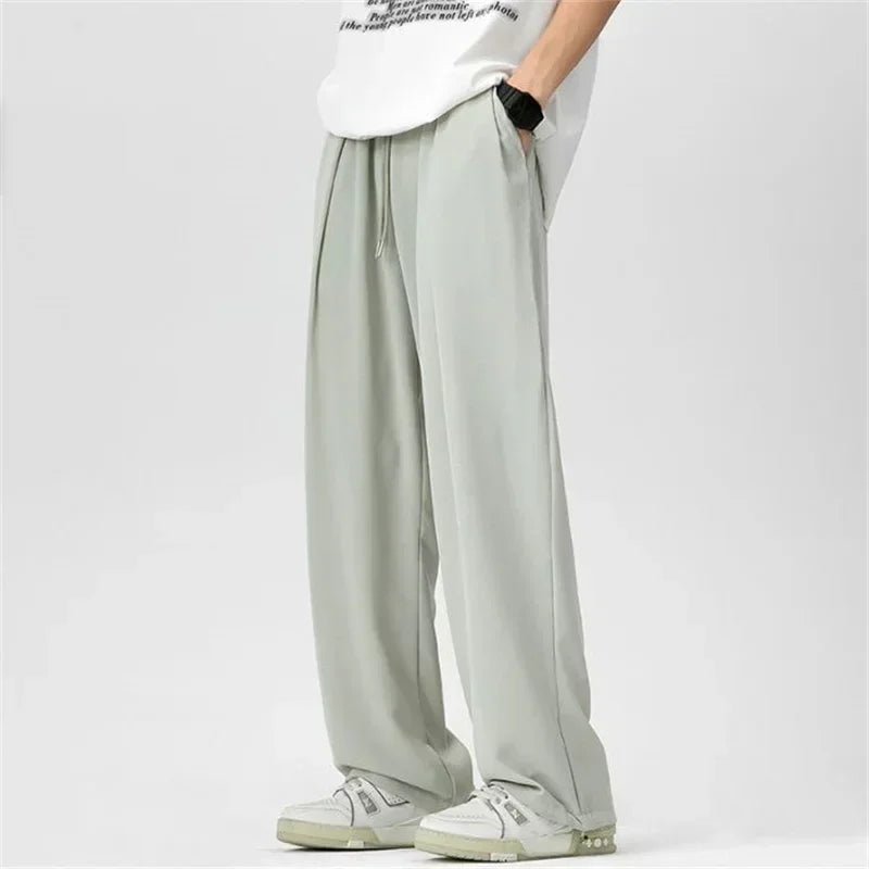 Pantalones bombachos holgados rectos lisos de verano para hombre, pantalones de chándal drapeados deportivos informales, pantalones de pierna ancha con cordón, novedad de 2025