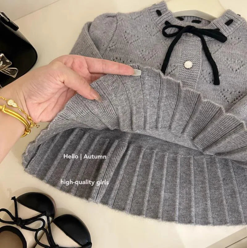 Conjunto para niñas 2025, Otoño Invierno, nuevo suéter gris de punto de manga larga, Falda plisada, conjunto de dos piezas para bebé a la moda