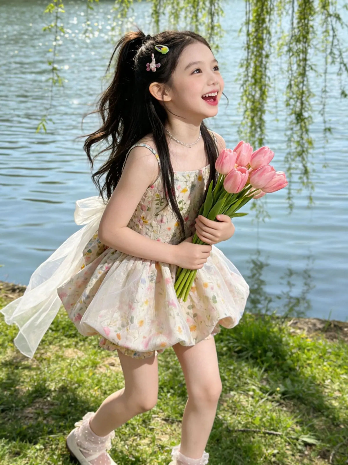 Vestido de tirantes floral para niñas, pantalones cortos con diseño de capullo de flor, vestido de princesa estilo occidental para verano 2026, falda esponjosa con lazo y cola de hilo para niñas