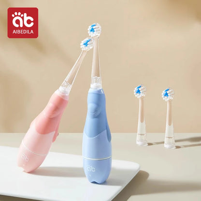 Cepillo de dientes eléctrico sónico para niños de 1 a 15 años, cuidado dental primario profesional, IPX7, resistente al agua, cerdas suaves DuPont