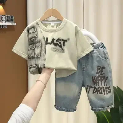 Conjunto de Verano para Niños 2026, Camiseta de Algodón con Estampado de Dibujos Animados y Letras + Pantalones Cortos de Mezclilla, Ropa Infantil