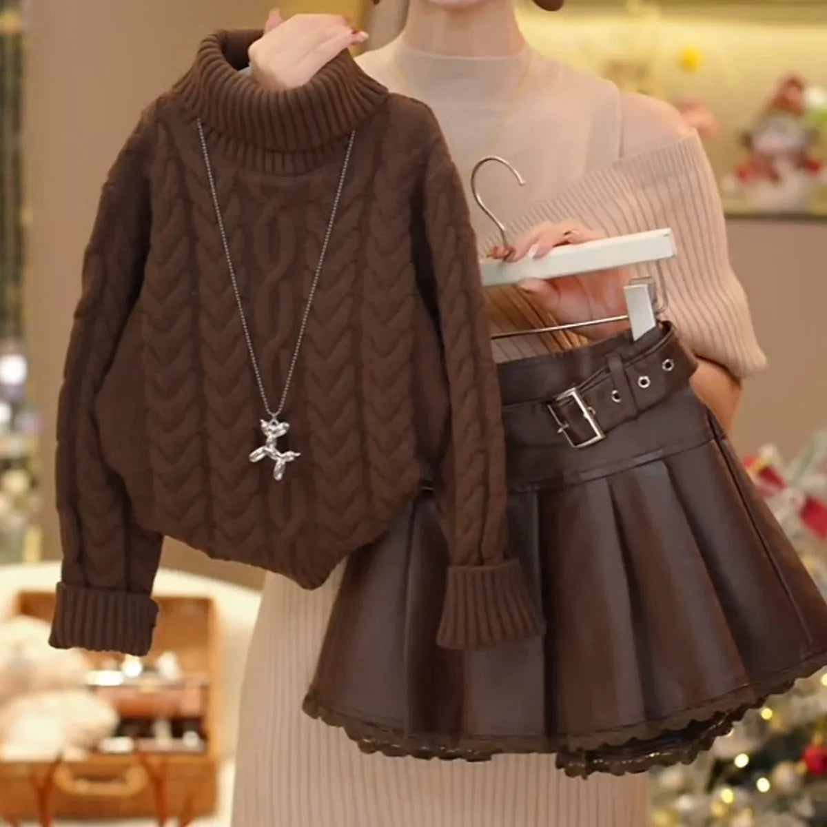 Conjunto de suéter para niñas, primavera, Otoño e Invierno, 2025, nueva moda para niños, suéter grueso versátil, falda de cuero de encaje, conjunto de dos piezas