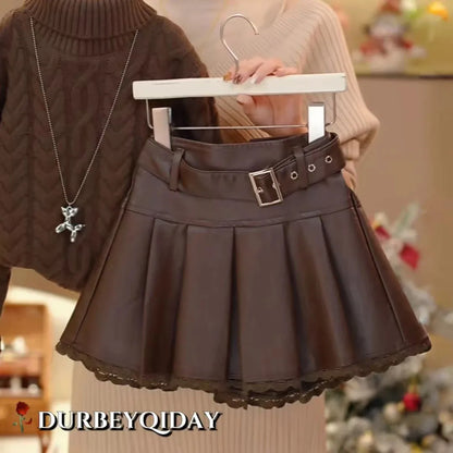 Conjunto de suéter para niñas, primavera, Otoño e Invierno, 2025, nueva moda para niños, suéter grueso versátil, falda de cuero de encaje, conjunto de dos piezas