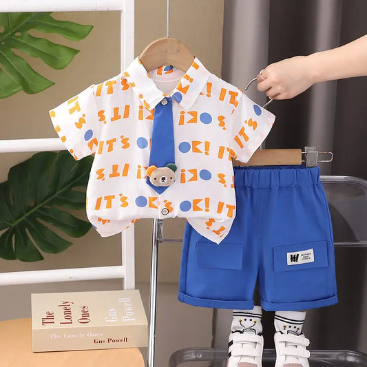 Nueva ropa informal para niños, traje de verano para niños y niñas, camisa con letras estampadas, pantalones cortos, 2 unids/set, ropa para niños pequeños de 0 a 5 años