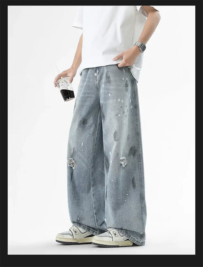 Pantalones vaqueros de pierna recta holgados rasgados de otoño para hombre, moda Hip Hop, pantalones vaqueros con estampado de grafiti, ropa de calle informal Y2K, pantalones vaqueros