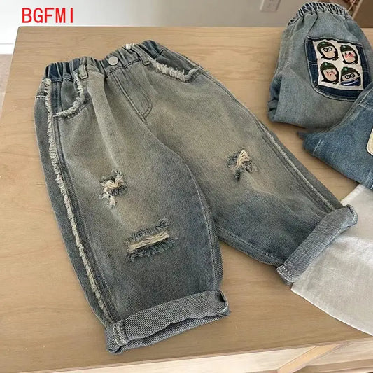 Pantalones vaqueros rasgados de dibujos animados a la moda para niños, pantalones vaqueros para niñas y niños, ropa coreana para niños, pantalones de pierna ancha, parte inferior de 2 a 10 años