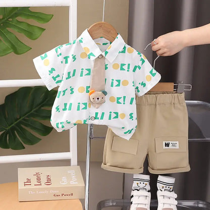 Nueva ropa informal para niños, traje de verano para niños y niñas, camisa con letras estampadas, pantalones cortos, 2 unids/set, ropa para niños pequeños de 0 a 5 años