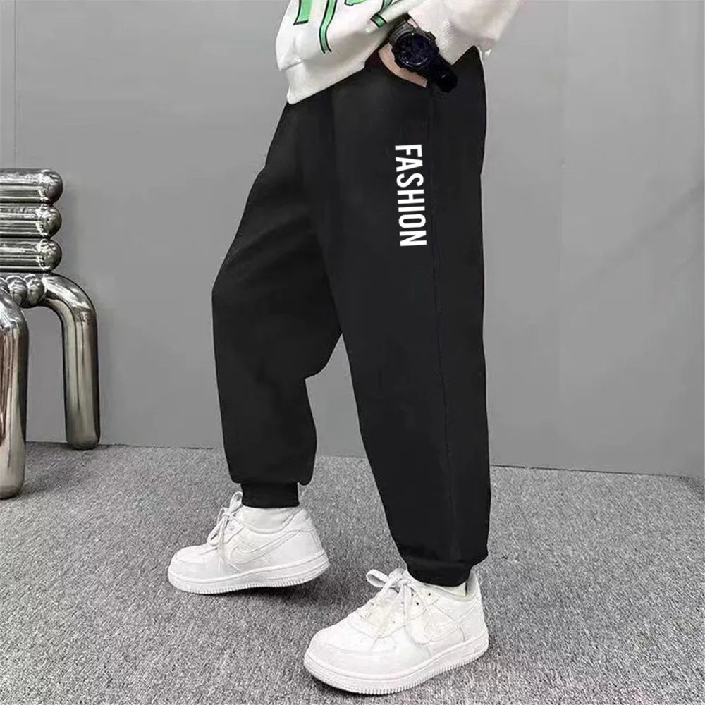 Pantalones de chándal deportivos con estampado de letras para niños, pantalones largos sueltos a la moda, pantalones para correr, pantalones deportivos finos informales para niños 2025, SPT01