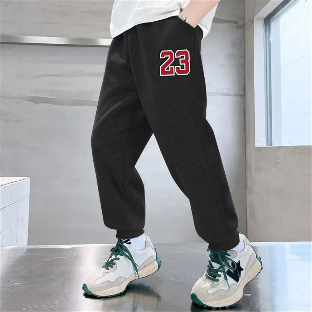 Pantalones de chándal deportivos con estampado de letras para niños, pantalones largos sueltos a la moda, pantalones para correr, pantalones deportivos finos informales para niños 2025, SPT01