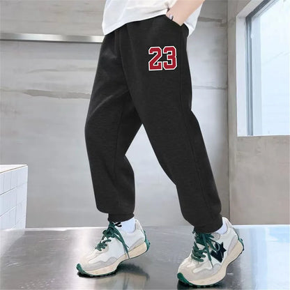 Pantalones de chándal deportivos con estampado de letras para niños, pantalones largos sueltos a la moda, pantalones para correr, pantalones deportivos finos informales para niños 2025, SPT01