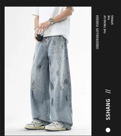 Pantalones vaqueros de pierna recta holgados rasgados de otoño para hombre, moda Hip Hop, pantalones vaqueros con estampado de grafiti, ropa de calle informal Y2K, pantalones vaqueros