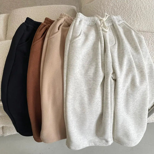 Otoño Invierno pantalones cálidos y de terciopelo para niños nuevo estilo pantalones de pierna ancha de terciopelo integrados para niños y niñas pantalones para niños