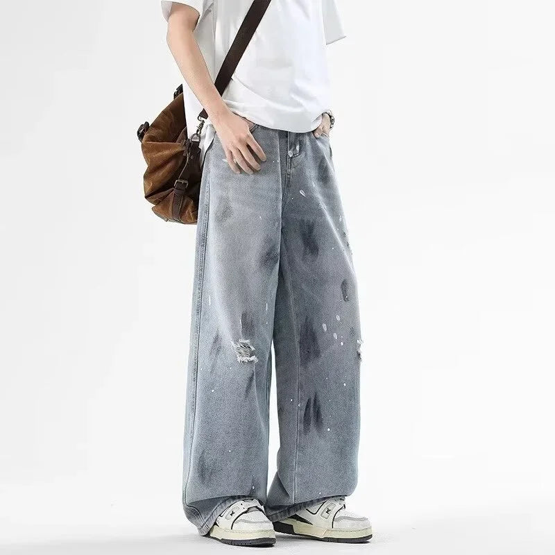 Pantalones vaqueros de pierna recta holgados rasgados de otoño para hombre, moda Hip Hop, pantalones vaqueros con estampado de grafiti, ropa de calle informal Y2K, pantalones vaqueros