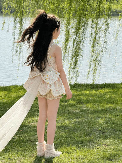 Vestido de tirantes floral para niñas, pantalones cortos con diseño de capullo de flor, vestido de princesa estilo occidental para verano 2026, falda esponjosa con lazo y cola de hilo para niñas