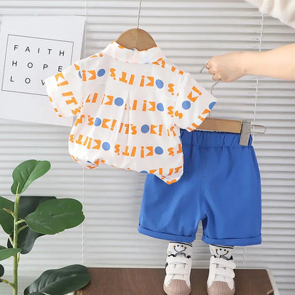 Nueva ropa informal para niños, traje de verano para niños y niñas, camisa con letras estampadas, pantalones cortos, 2 unids/set, ropa para niños pequeños de 0 a 5 años