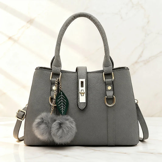 Bolsos de compras con bolas de pelo a la moda para mujer, bolso de mano de piel sintética de Color sólido de gran capacidad, bolso de hombro tipo bandolera de diseñador de lujo para mujer