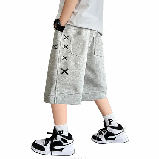Tween Boys nuevo verano Capris pantalones cortos de algodón niños sueltos estilo Casual pantalones cortos deportivos para adolescente 5 6 8 9 10 12 13 14 años