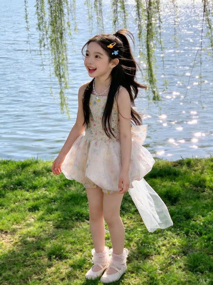 Vestido de tirantes floral para niñas, pantalones cortos con diseño de capullo de flor, vestido de princesa estilo occidental para verano 2026, falda esponjosa con lazo y cola de hilo para niñas