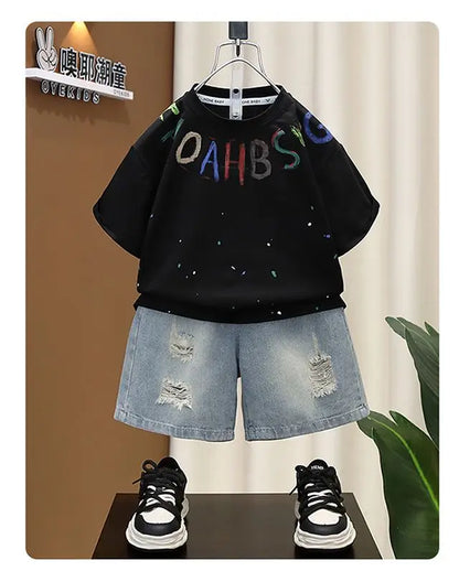 Conjunto de Verano para Niños 2026, Camiseta de Algodón con Estampado de Dibujos Animados y Letras + Pantalones Cortos de Mezclilla, Ropa Infantil