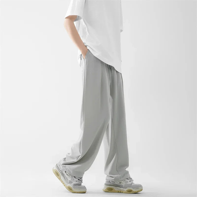 Pantalones bombachos holgados rectos lisos de verano para hombre, pantalones de chándal drapeados deportivos informales, pantalones de pierna ancha con cordón, novedad de 2025