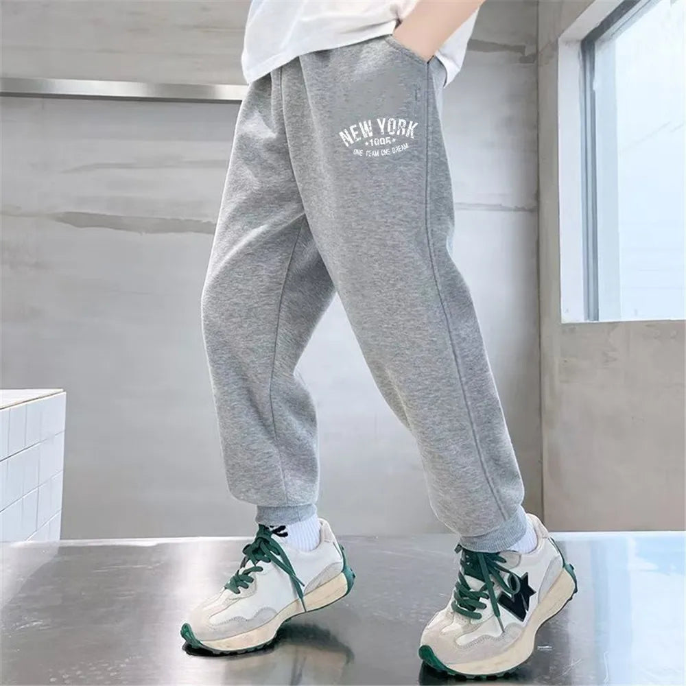 Pantalones de chándal deportivos con estampado de letras para niños, pantalones largos sueltos a la moda, pantalones para correr, pantalones deportivos finos informales para niños 2025, SPT01