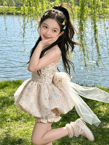 Vestido de tirantes floral para niñas, pantalones cortos con diseño de capullo de flor, vestido de princesa estilo occidental para verano 2026, falda esponjosa con lazo y cola de hilo para niñas