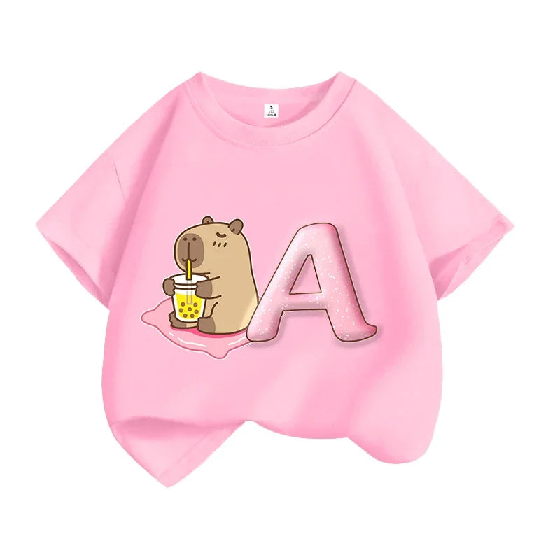 Camiseta de algodón de manga corta con estampado de capibara para niños, diseño de dibujos animados, estilo veraniego y moderno.