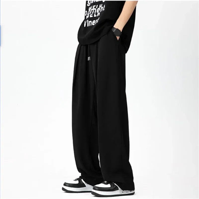 Pantalones bombachos holgados rectos lisos de verano para hombre, pantalones de chándal drapeados deportivos informales, pantalones de pierna ancha con cordón, novedad de 2025