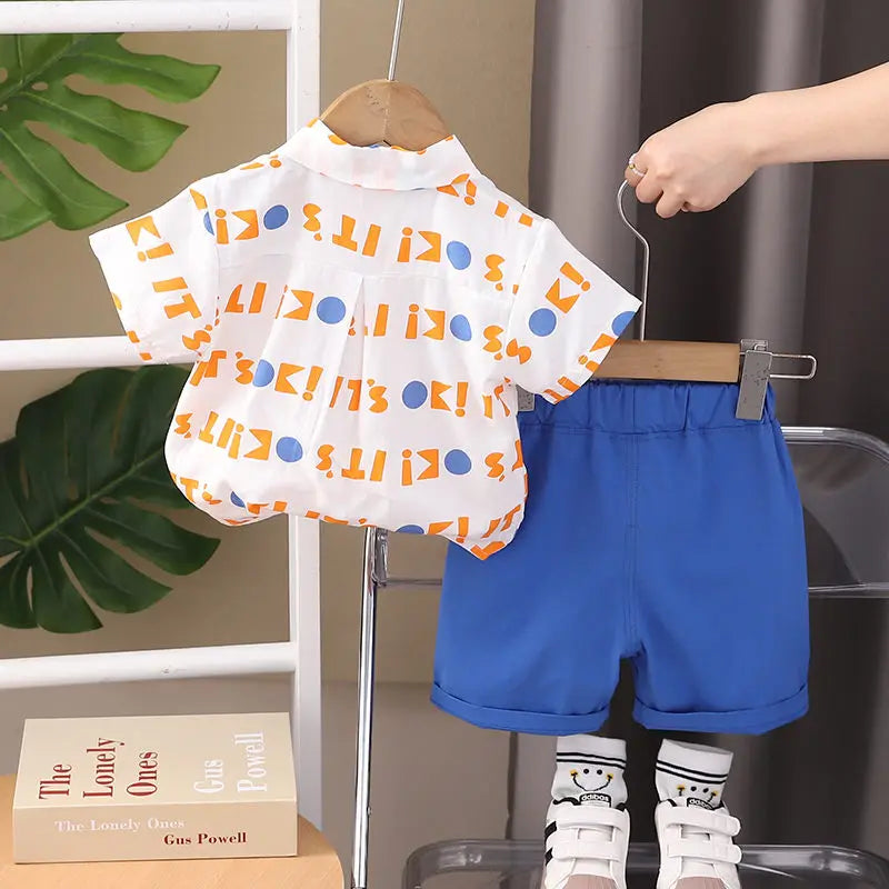 Nueva ropa informal para niños, traje de verano para niños y niñas, camisa con letras estampadas, pantalones cortos, 2 unids/set, ropa para niños pequeños de 0 a 5 años