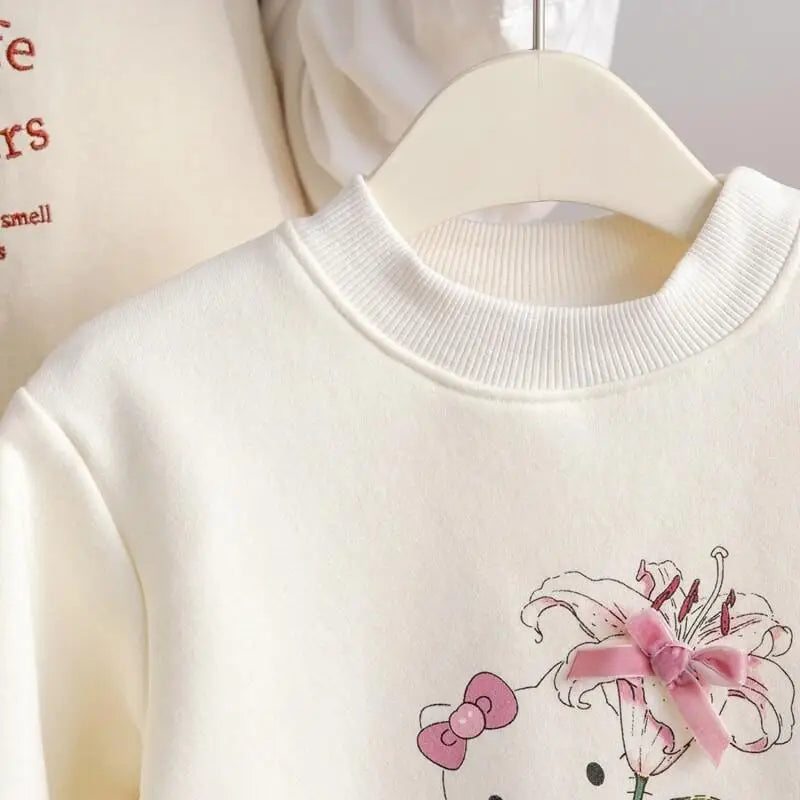 Sanrio Hello Kitty 2025 Otoño Invierno nuevas niñas estampado de gato polar cálido Top con lazo decoración 3D vestido con capucha para niños lindo