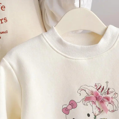 Sanrio Hello Kitty 2025 Otoño Invierno nuevas niñas estampado de gato polar cálido Top con lazo decoración 3D vestido con capucha para niños lindo